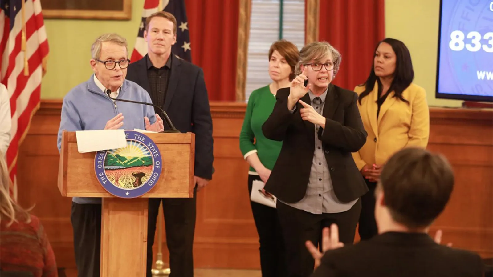 Marla Berkowitz interprets for Gov. Mike DeWine at coronavirus briefings.