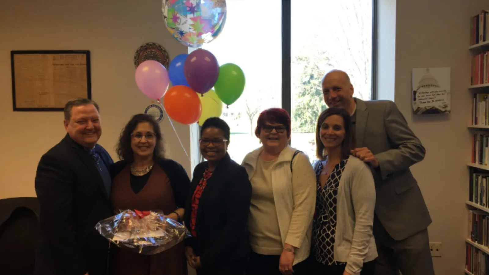 Karen, second from left, receives her 2017 Distinguished Staff award.