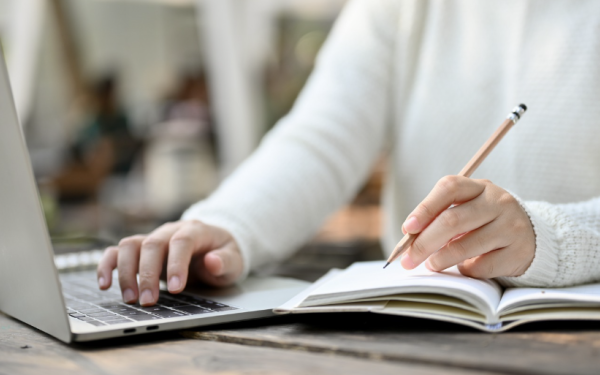 A student taking notes