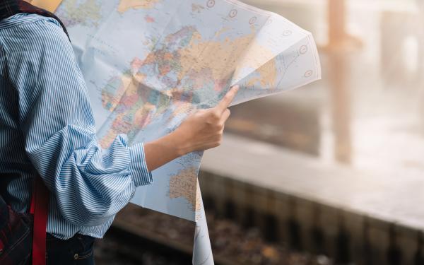 A woman reading a map