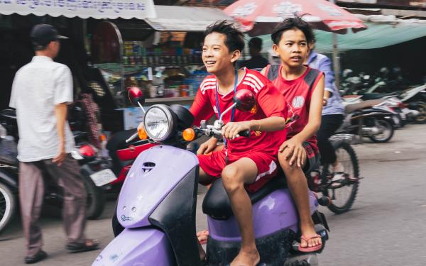 Kids on a motorbike in Phnom Penh
