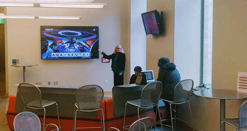 The Crane Cafe Fireside Chat area features a new 80-inch tv.