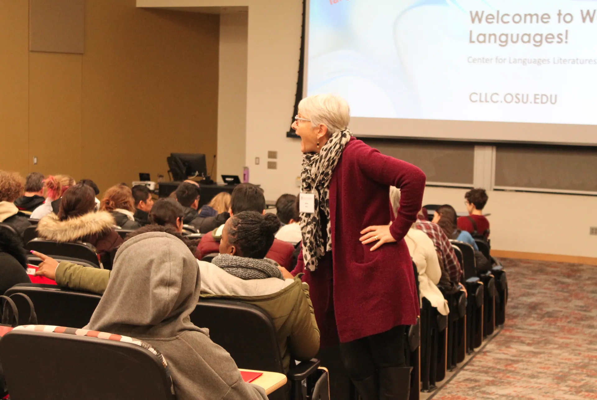 Students and parents in Hagerty 180 listening to Janice Aski