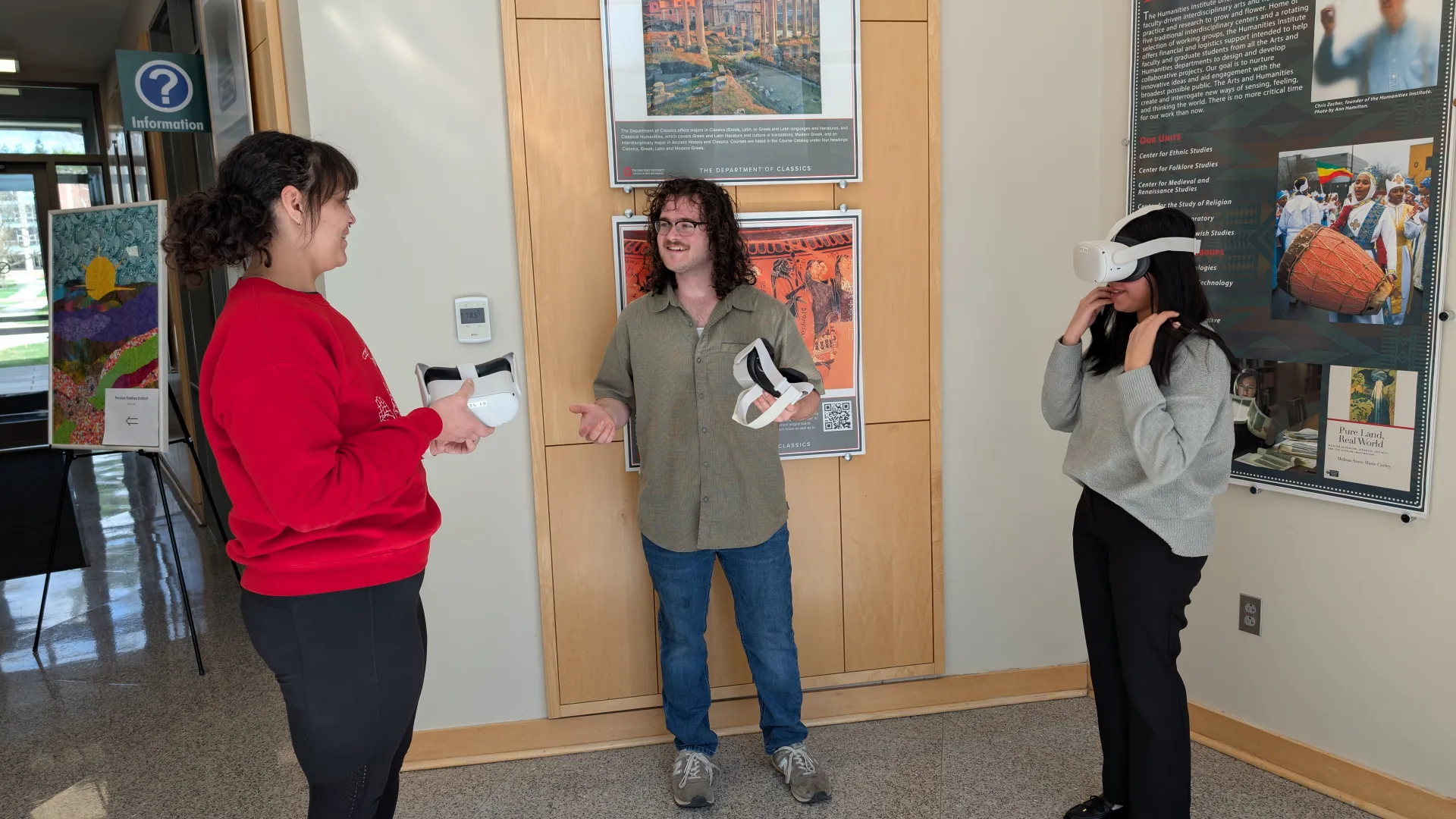 Students check out MetaQuest VR headsets.