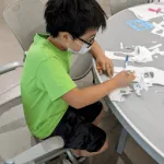 A student completing an activity